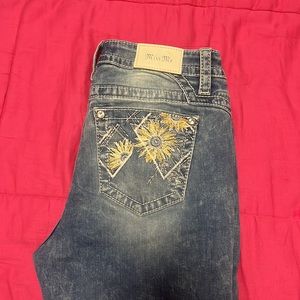 Women’s boot cut miss me jeans